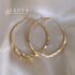 2026 New Twisted Zircon Hoop Earrings for Women Gold Plated Cross Twisted Cuff Earrings Sparkling Micro Paved CZ Party Jewelry
